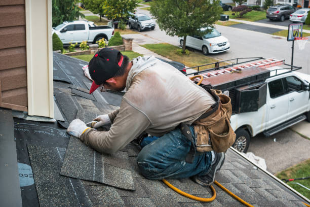 Professional Flat Roof Repair technician working in Lehigh Acres, FL